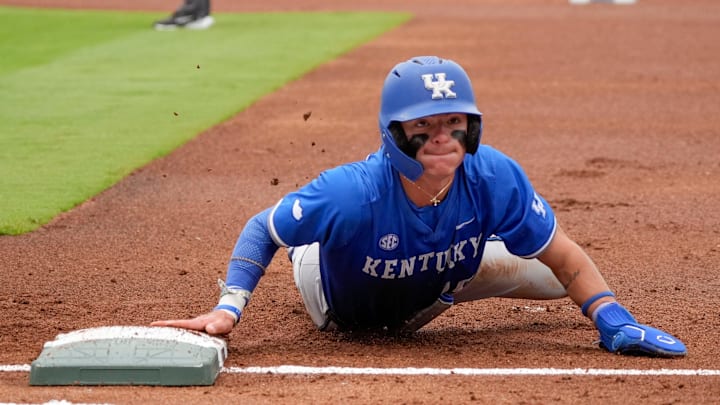 May 20, 2025; Hoover, AL, USA; Kentucky second baseman Luke Lawrence (10) dives back to first on a pickoff attempt during the game with Oklahoma in the first round of the SEC Baseball Tournament at the Hoover Met.
