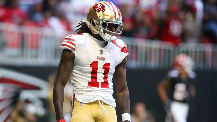 Oct 16, 2022; Atlanta, Georgia, USA; San Francisco 49ers wide receiver Brandon Aiyuk (11) celebrates after a touchdown against the Atlanta Falcons in the second quarter at Mercedes-Benz Stadium.