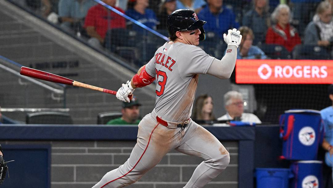 Sep 24, 2025; Toronto, Ontario, CAN;  Boston Red Sox second baseman Romy Gonzalez (23) hits a single against the Toronto Blue Jays in the eighth inning at Rogers Centre. Mandatory Credit: Dan Hamilton-Imagn Images