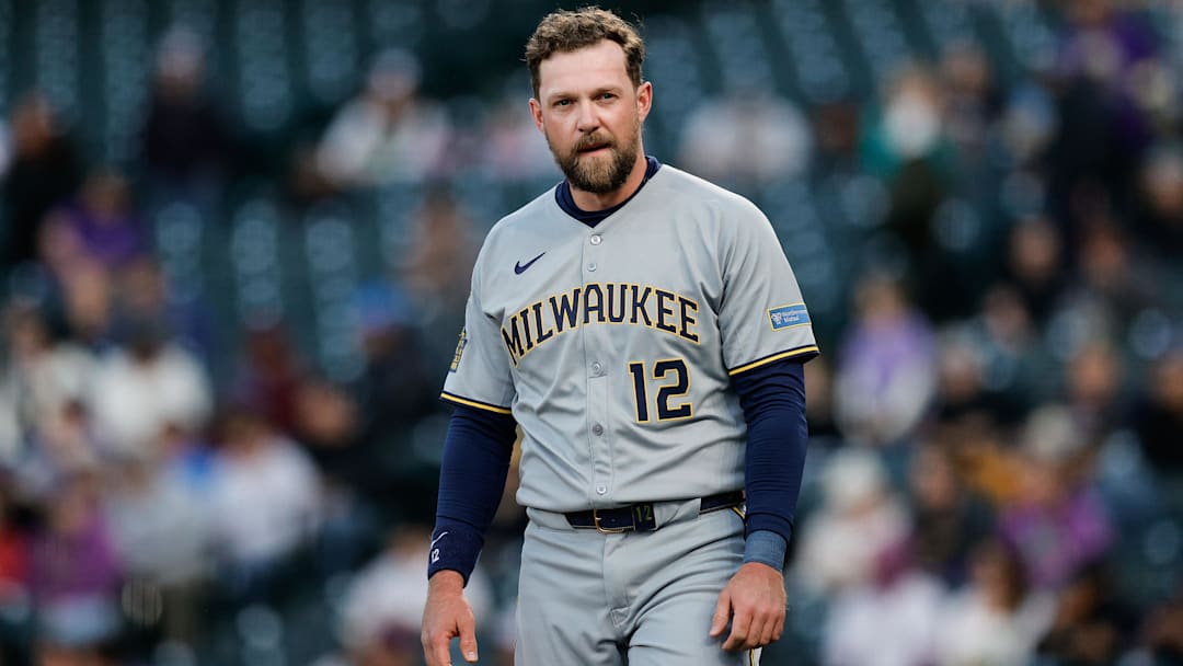 Apr 9, 2025; Denver, Colorado, USA; Milwaukee Brewers first baseman Rhys Hoskins (12) in the second inning against the Colorado Rockies at Coors Field. Mandatory Credit: Isaiah J. Downing-Imagn Images