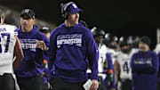 Oct 11, 2024; College Park, Maryland, USA;  Northwestern Wildcats head coach David Braun walks thew sidelines during the first half against the Maryland Terrapins at SECU Stadium. Mandatory Credit: Tommy Gilligan-Imagn Images