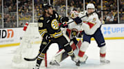 May 17, 2024; Boston, Massachusetts, USA; Boston Bruins right wing David Pastrnak (88) and Florida Panthers defenseman Niko Mikkola (77) battle in front of goaltender Sergei Bobrovsky (72) during the first period in game six of the second round of the 2024 Stanley Cup Playoffs at TD Garden. Mandatory Credit: Bob DeChiara-Imagn Images