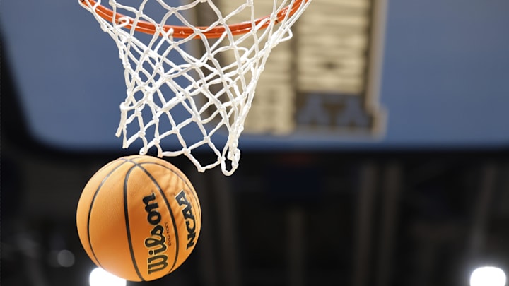 Close up as a ball goes through the net during the NCAA Tournament First Four Practice at UD Arena. 