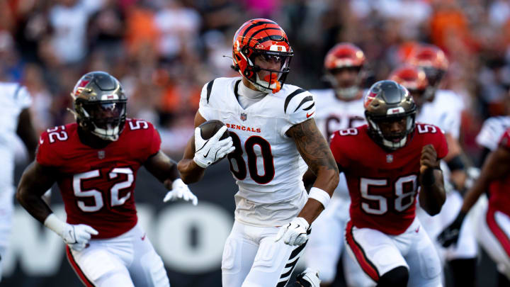 Cincinnati Bengals wide receiver Andrei Iosivas (80) runs after the catch for a first down in the first quarter of the NFL preseason game against the Tampa Bay Buccaneers at Paycor Stadium in Cincinnati Saturday, August 10, 2024.