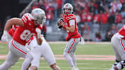 Nov 22, 2025; Columbus, Ohio, USA; Ohio State Buckeyes quarterback Julian Sayin (10) looks to throw a pass to tight end Maxence LeBlanc (88) against the Rutgers Scarlet Knights during the first quarter at Ohio Stadium. Mandatory Credit: Joseph Maiorana-Imagn Images