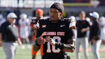 Oklahoma State Cowboys quarterback Sam Jackson V (18) warms up before a college football game between the Oklahoma State Cowboys (OSU) and the Houston Cougars at Boone Pickens Stadium in Stillwater, Okla., Saturday, Oct. 11, 2025.