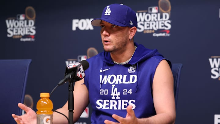 Dodgers shortstop Miguel Rojas (11) speaks at a press conference before game two of the 2024 MLB World Series at Dodger Stadium. 