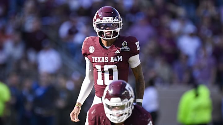 Dec 20, 2025; College Station, TX, USA; Texas A&M Aggies quarterback Marcel Reed (10) looks on during the game between the Aggies and the Hurricanes at Kyle Field. Mandatory Credit: Jerome Miron-Imagn Images
