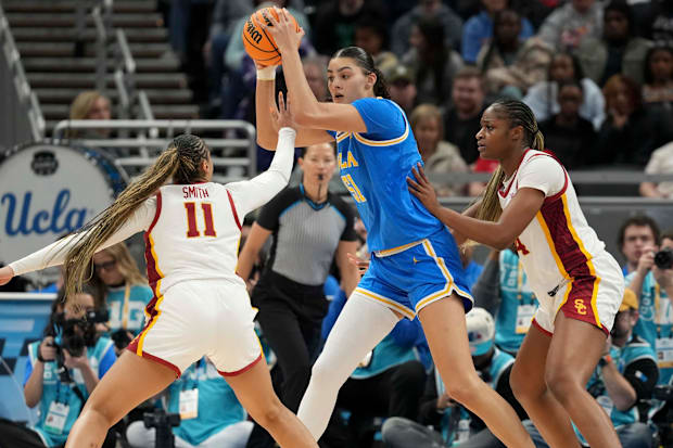 UCLA basketball player Lauren Betts up against USC. 