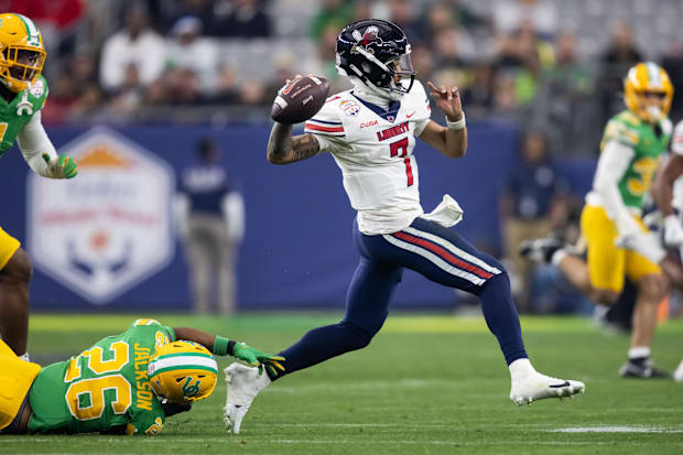 Jan 1, 2024; Glendale, AZ, USA; Liberty Flames quarterback Kaidon Salter (7) against the Oregon Ducks in the 2024 Fiesta Bowl