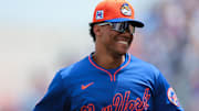 Mar 24, 2025; Port St. Lucie, Florida, USA; New York Mets right fielder Juan Soto (22) returns to the dugout against the New York Yankees during the first inning at Clover Park.