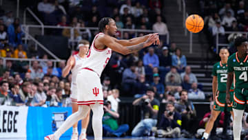 Mar 19, 2023; Albany, NY, USA; Indiana Hoosiers guard Tamar Bates (53) passes the ball against the Miami Hurricanes during the first half at MVP Arena. Mandatory Credit: Gregory Fisher-Imagn Images