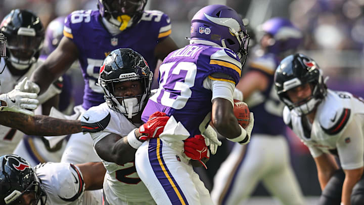 Aug 9, 2025; Minneapolis, Minnesota, USA; Houston Texans cornerback Myles Bryant (27) tackles Minnesota Vikings wide receiver Silas Bolden (83) during the fourth quarter at U.S. Bank Stadium. Mandatory Credit: Jeffrey Becker-Imagn Images