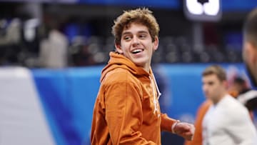 Jan 1, 2025; Atlanta, GA, USA; Texas Longhorns quarterback Arch Manning (16) warms up before the Peach Bowl at Mercedes-Benz Stadium.
