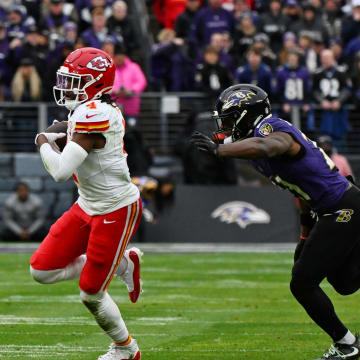 Jan 28, 2024; Baltimore, Maryland, USA; Kansas City Chiefs wide receiver Rashee Rice (4) runs with the ball against the Baltimore Ravens during the first half in the AFC Championship football game at M&T Bank Stadium. Mandatory Credit: Tommy Gilligan-USA TODAY Sports