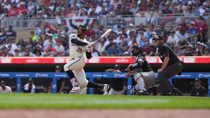 Aug 11, 2024; Minneapolis, Minnesota, USA; Minnesota Twins center fielder Byron Buxton (25) hits into a fielder’s choice during the sixth inning against the Cleveland Guardians at Target Field. Mandatory Credit: Jordan Johnson-USA TODAY Sports