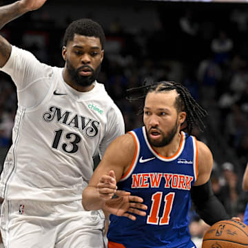 Nov 27, 2024; Dallas, Texas, USA; Dallas Mavericks forward Naji Marshall (13) and New York Knicks guard Jalen Brunson (11) in action during the game between the Dallas Mavericks and the New York Knicks at the American Airlines Center. Mandatory Credit: Jerome Miron-Imagn Images