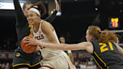Jan 30, 2025; Austin, Texas, USA; Texas Longhorns guard Ndjakalenga Mwenentanda (32) drives to the basket while defended by Missouri Tigers guard Ashton Judd (24) and Averi Kroenke (21) during the first half at Moody Center. Mandatory Credit: Scott Wachter-Imagn Imagesl