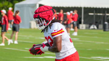 Jul 22, 2024; St. Joseph, MO, USA; Kansas City Chiefs linebacker Nick Bolton (32) runs the ball during training camp at Missouri Western State University. Mandatory Credit: Denny Medley-USA TODAY Sports