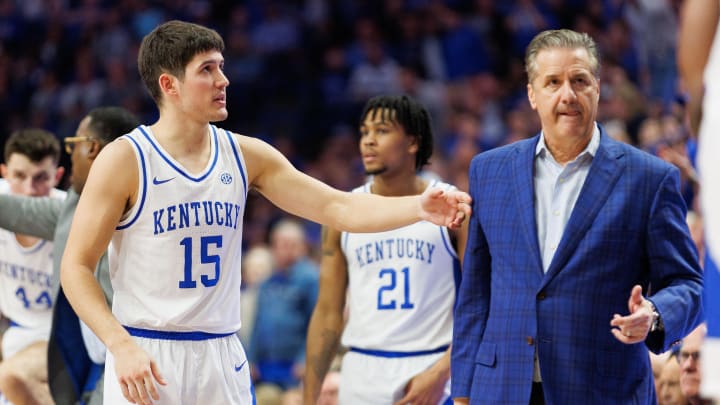 Feb 10, 2024; Lexington, Kentucky, USA; Kentucky Wildcats guard Reed Sheppard (15) talks with head coach John Calipari. 