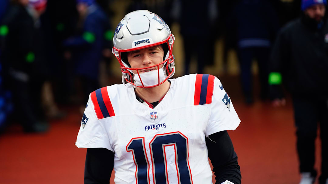 Dec 31, 2023; Orchard Park, New York, USA; New England Patriots quarterback Mac Jones (10) walks out before playing the Buffalo Bills. Dec 31, 2023; Orchard Park, New York, USA; New England Patriots quarterback Mac Jones (10) walks out before playing the Buffalo Bills.