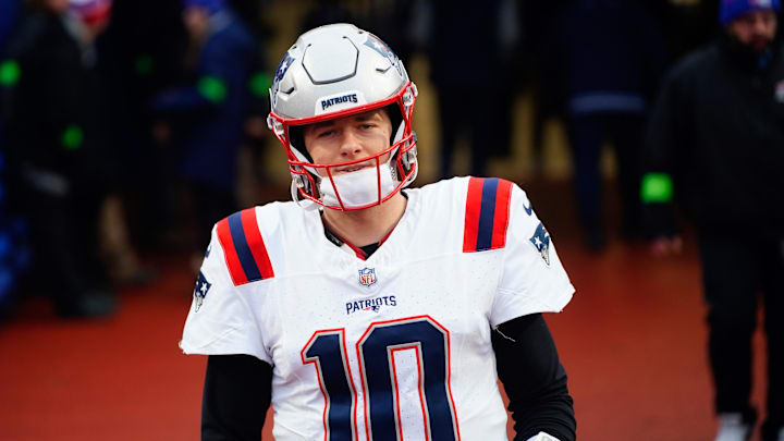 Dec 31, 2023; Orchard Park, New York, USA; New England Patriots quarterback Mac Jones (10) walks out to the field prior to the game against the Buffalo Bills at Highmark Stadium.