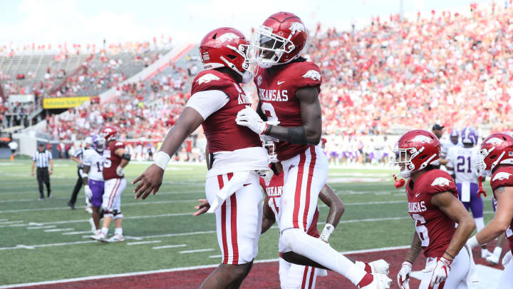 Sep 2, 2023; Little Rock, Arkansas, USA; Arkansas Razorbacks quarterback KJ Jefferson (1) and wide receiver Andrew Armstrong (2) celebrate after a touchdown against the Western Carolina Catamounts at War Memorial Stadium. Arkansas won 56-13. Mandatory Credit: Nelson Chenault-USA TODAY Sports