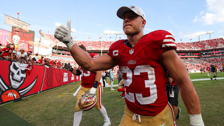 Nov 10, 2024; Tampa, Florida, USA; San Francisco 49ers running back Christian McCaffrey (23) celebrates after beating the Tampa Bay Buccaneers at Raymond James Stadium. Mandatory Credit: Nathan Ray Seebeck-Imagn Images