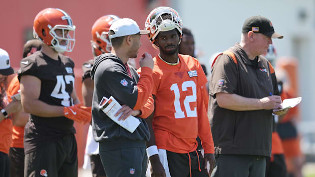 Cleveland Browns quarterback Shedeur Sanders (12) waits his turn for a drill during rookie minicamp at CrossCountry Mortgage