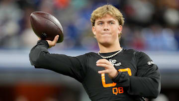 Mar 1, 2025; Indianapolis, IN, USA; Mississippi quarterback Jaxson Dart (QB03) during the 2025 NFL Combine at Lucas Oil Stadium. Mandatory Credit: Kirby Lee-Imagn Images