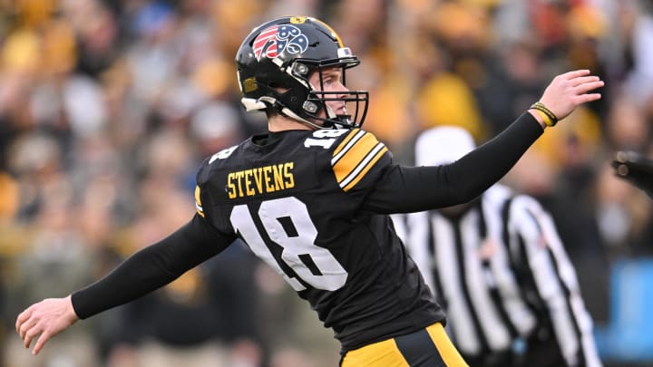 Nov 11, 2023; Iowa City, Iowa, USA; Iowa Hawkeyes place kicker Drew Stevens (18) watches a 32 yard field goal during the second quarter against the Rutgers Scarlet Knights at Kinnick Stadium. Mandatory Credit: Jeffrey Becker-USA TODAY Sports