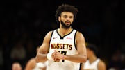 Nov 29, 2025; Phoenix, Arizona, USA; Denver Nuggets guard Jamal Murray (27) against the Phoenix Suns at the Mortgage Matchup Center. Mandatory Credit: Mark J. Rebilas-Imagn Images