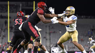 Sep 9, 2023; San Diego, California, USA; UCLA Bruins linebacker Choe Bryant-Strother (9) battles