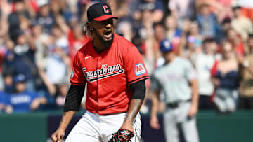 Aug 25, 2024; Cleveland, Ohio, USA; Cleveland Guardians relief pitcher Emmanuel Clase (48) reacts after striking out Texas Rangers first baseman Nathaniel Lowe (not pictured) to end the game at Progressive Field. Mandatory Credit: Ken Blaze-Imagn Images