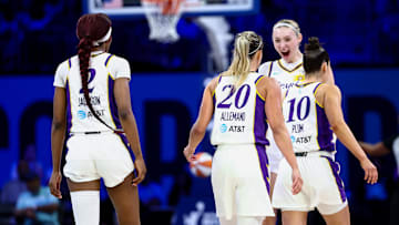 Aug 15, 2025; Arlington, Texas, USA;  Los Angeles Sparks forward Rickea Jackson (2) celebrates with Los Angeles Sparks guard Julie Allemand (20) and Los Angeles Sparks guard Kelsey Plum (10) and Los Angeles Sparks forward Cameron Brink (22) against the Dallas Wings during the second half at College Park Center. Mandatory Credit: Kevin Jairaj-Imagn Images