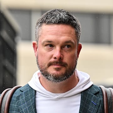 Nov 8, 2025; Iowa City, Iowa, USA; Oregon Ducks head coach Dan Lanning enters Kinnick Stadium before the game against the Iowa Hawkeyes. Mandatory Credit: Jeffrey Becker-Imagn Images