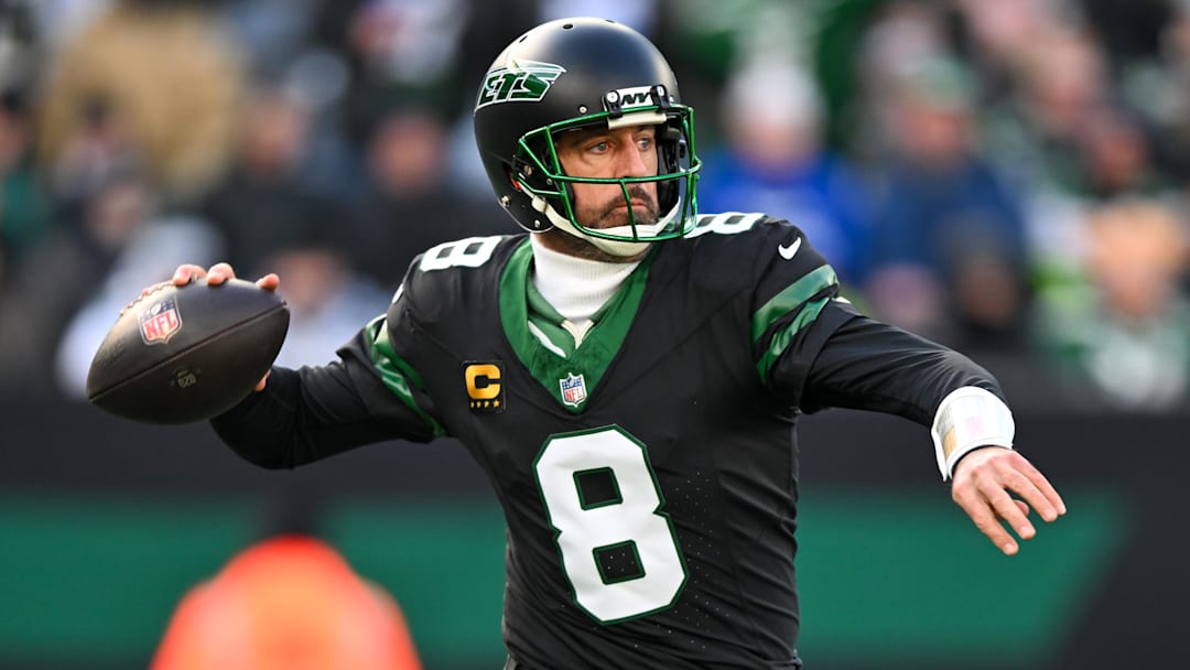 Dec 1, 2024; East Rutherford, New Jersey, USA; New York Jets quarterback Aaron Rodgers looks to pass the ball during the first quarter against the Seattle Seahawks at MetLife Stadium.