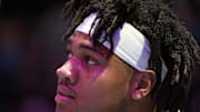 Mar 5, 2025; Charlotte, North Carolina, USA;  Minnesota Timberwolves guard Terrence Shannon Jr. (00) during a time out in the second half against the Charlotte Hornets at the Spectrum Center. Mandatory Credit: Sam Sharpe-Imagn Images