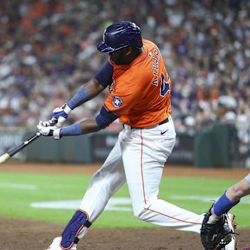 Jul 26, 2024; Houston, Texas, USA; Houston Astros designated hitter Yordan Alvarez (44) bats during the third inning against the Los Angeles Dodgers at Minute Maid Park.