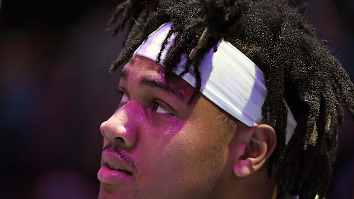 Mar 5, 2025; Charlotte, North Carolina, USA;  Minnesota Timberwolves guard Terrence Shannon Jr. (00) during a time out in the second half against the Charlotte Hornets at the Spectrum Center. Mandatory Credit: Sam Sharpe-Imagn Images