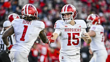 Nov 1, 2025; College Park, Maryland, USA;  Indiana Hoosiers quarterback Fernando Mendoza (15) celebrates with  running back Roman Hemby (1) after scoring a touchdown during the second half against the Maryland Terrapins at SECU Stadium. Mandatory Credit: Tommy Gilligan-Imagn Images
