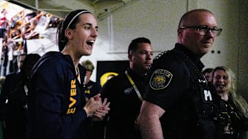 Indiana Fever guard Caitlin Clark walks back into the tunnel after the Fever defeated Brazil in a WNBA preseason game.
