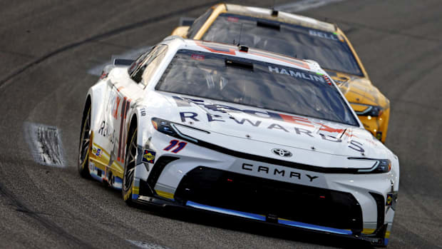 Denny Hamlin (11) leads Christopher Bell (20) during the Cook Out 400 at Richmond Raceway.