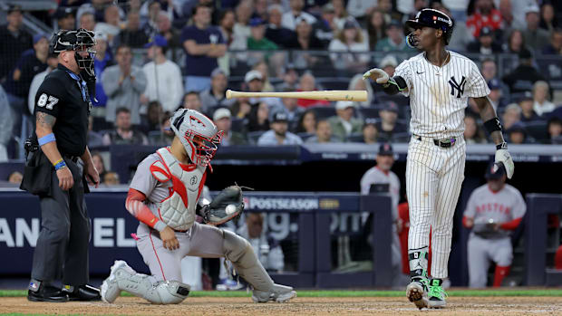 Jazz Chisholm tosses his bat after working a walk