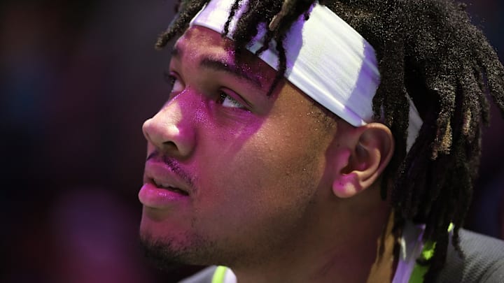 Mar 5, 2025; Charlotte, North Carolina, USA;  Minnesota Timberwolves guard Terrence Shannon Jr. (00) during a time out in the second half against the Charlotte Hornets at the Spectrum Center. Mandatory Credit: Sam Sharpe-Imagn Images