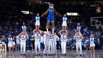 The Kentucky cheer squad entertains during a timeout during their SEC Men's Basketball Tournament quarterfinal game against Texas A&M at Bridgestone Arena in Nashville, Tenn., Friday, March 15, 2024.at Bridgestone Arena in Nashville, Tenn., Friday, March 15, 2024.