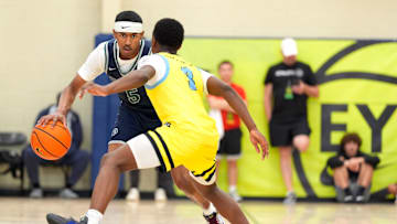 July 15, 2025; North Augusta, South Carolina, USA; Oakland Soldiers Jason Crowe Jr. (5) dribbles as Team Final RJ Smith (3) defends during the Oakland Soldiers and Team Final game at Nike EYBL Peach Jam at Riverview Park Activities Center. The Oakland Soldiers won 86-75. Mandatory Credit: Katie Goodale - Augusta Chronicle/USA TODAY NETWORK