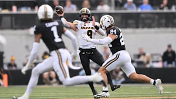 Missouri Tigers quarterback Beau Pribula (9) throws a pass, in a game versus the Vanderbilt Commodores this season.