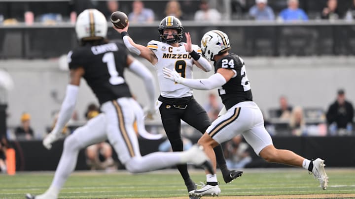 Missouri Tigers quarterback Beau Pribula (9) throws a pass, in a game versus the Vanderbilt Commodores this season.