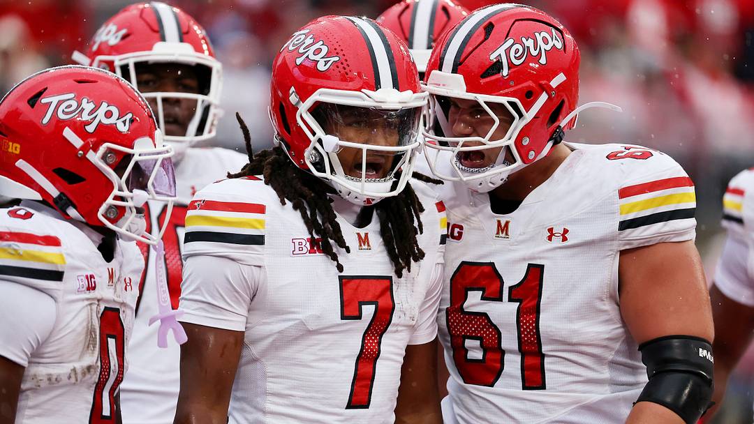 Oct 10, 2026; Columbus, Ohio, USA; Maryland Terrapins quarterback Malik Washington (7) celebrates his touchdown run with Maryland Terrapins offensive lineman Michael Hershey (61) during the second quarter against the Ohio State Buckeyes at Ohio Stadium. Mandatory Credit: Joseph Maiorana-Imagn Images Oct 10, 2026; Columbus, Ohio, USA; Maryland Terrapins quarterback Malik Washington (7) celebrates his touchdown run with Maryland Terrapins offensive lineman Michael Hershey (61) during the second quarter against the Ohio State Buckeyes at Ohio Stadium. Mandatory Credit: Joseph Maiorana-Imagn Images